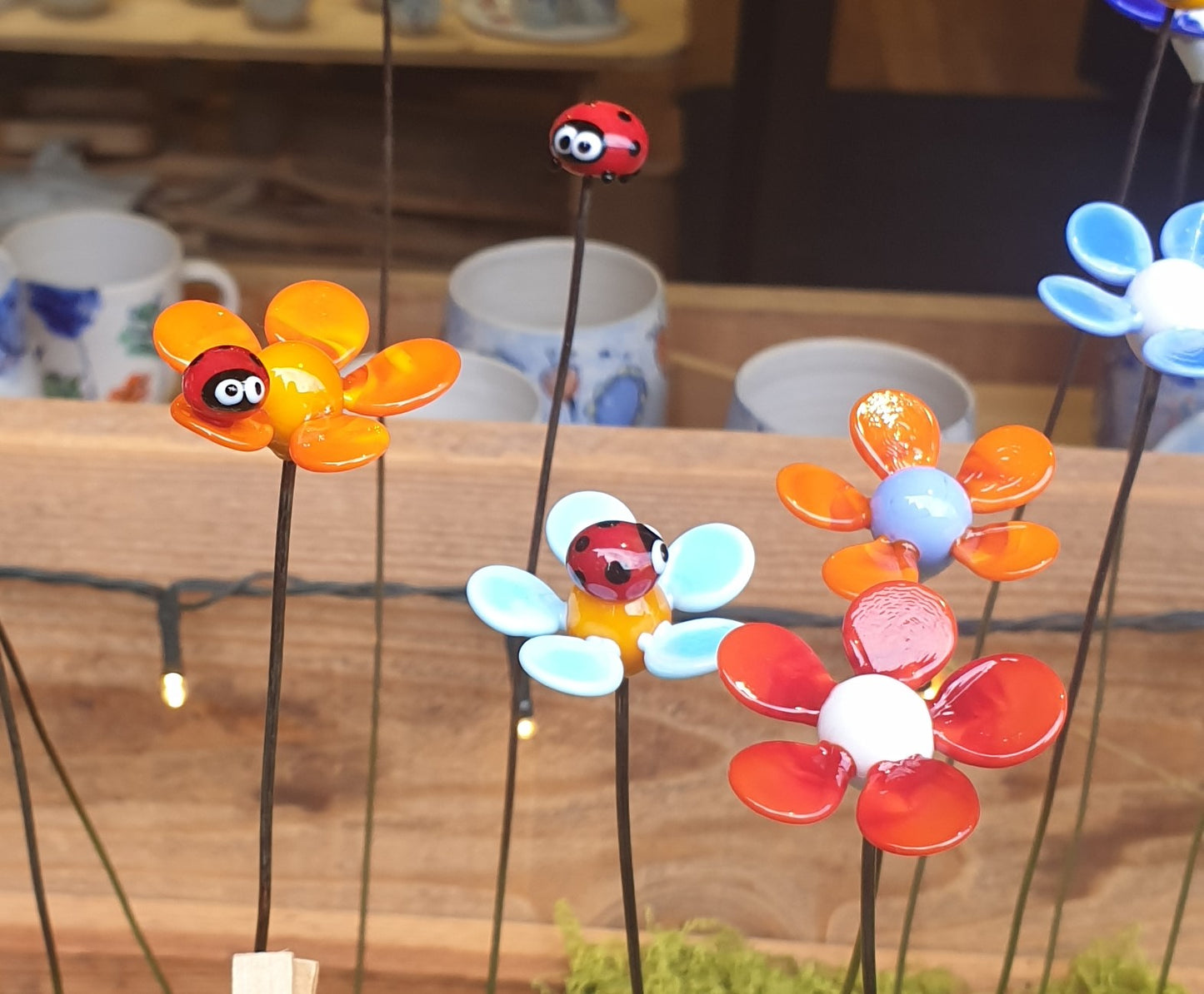 Coccinelle sur fleur en verre filé
