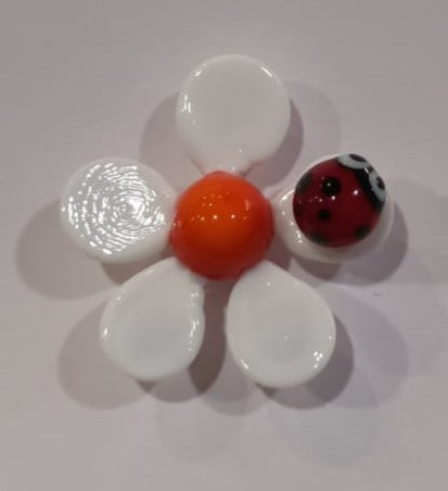 Coccinelle sur fleur en verre filé